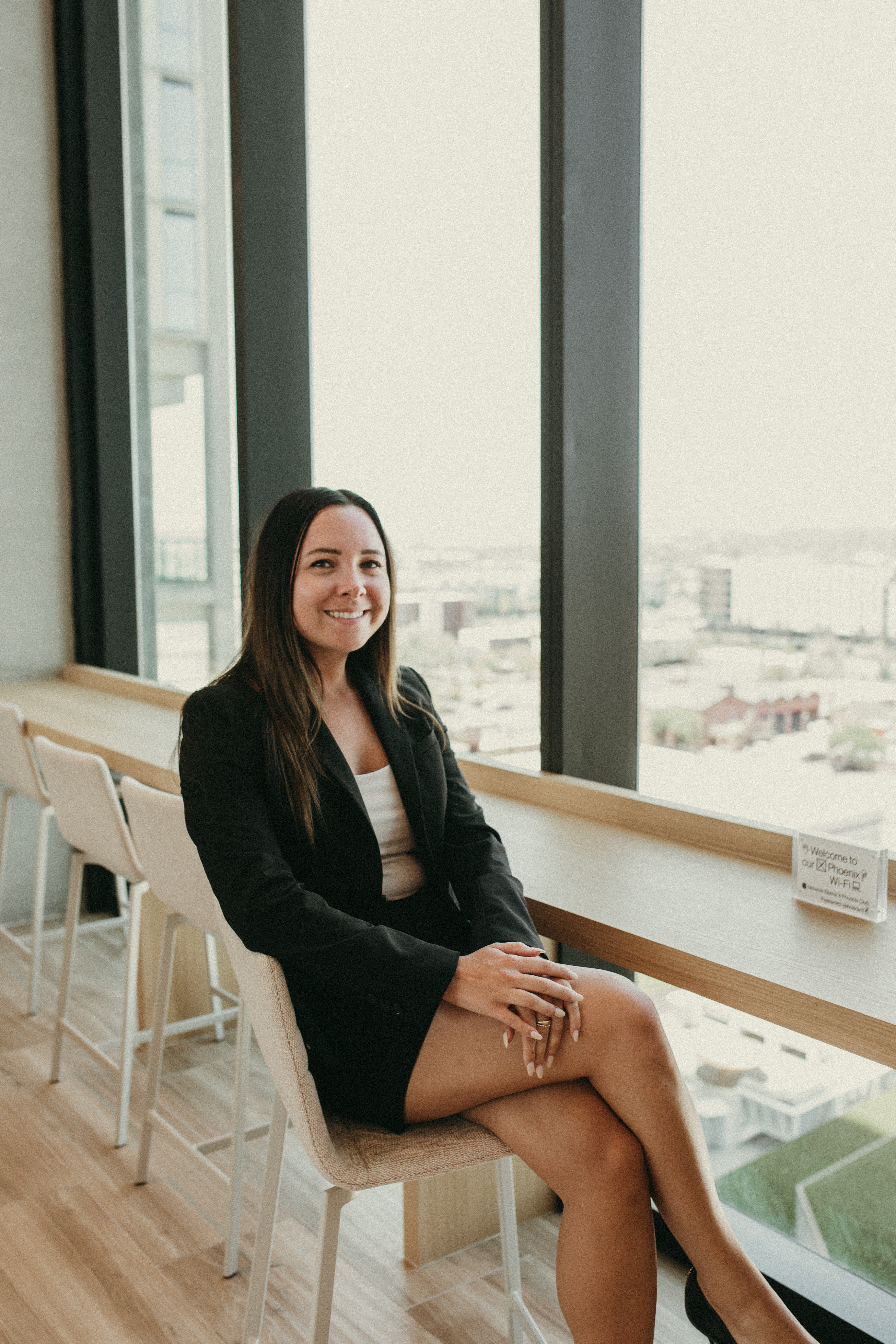 Mallory in a light filled office environment